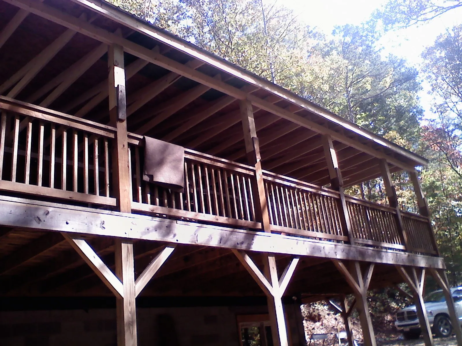 Timber framing under a new elevated porch and deck — Roof Leak Repair in Randolph by Roofing Brothers